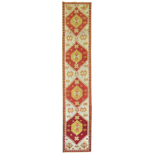 Narrow Turkish Sivas runner with icy blue field and deep reds.