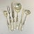 These are a dramatic set of 6 serving utensils from the 1920s. They feature Mother of Pearl handles with a Sterling Silver...