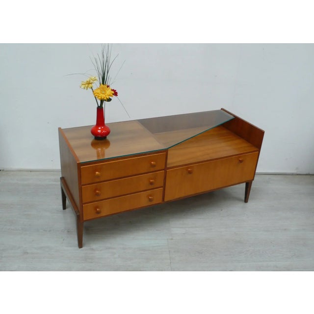 1960s chest of drawers, sideboard, lowboard with 3 drawers, open shelving and slanted glass top, in walnut, unusual,...