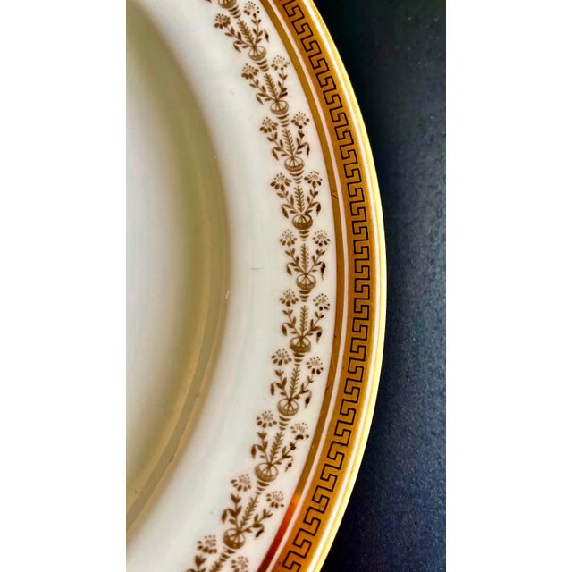 Late 19th c. Cauldon Neoclassical dinner plates with a stunning gilt Greek key and foliate design. These plates were...