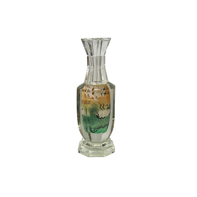 This piece of art features a mesmerizing glass bottle vase adorned with intricate Chinese-inspired oriental scenery. The...