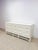 This gorgeous vintage white rattan 9-drawer dresser is a standout Old Florida and coastal decorative find. The crisp white...
