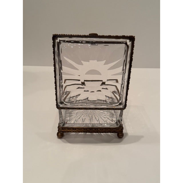 Superbly elegant large cut crystal box in the style of Baccarat having brass mounts.