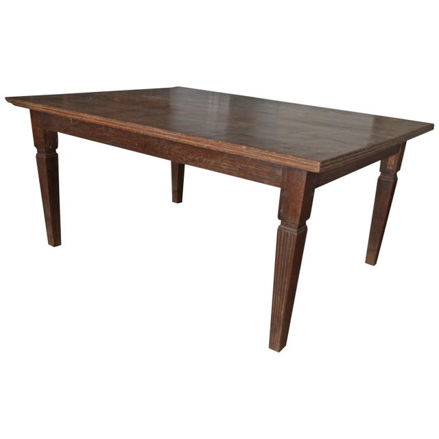 Stunning, rare, antique teak wood dining table with a hand carved bevelled edge and hand carved legs with beautiful...