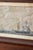 Antique maritime engraving depicting a sailing vessel at sea with finely detailed linework, period typography, and a solid...