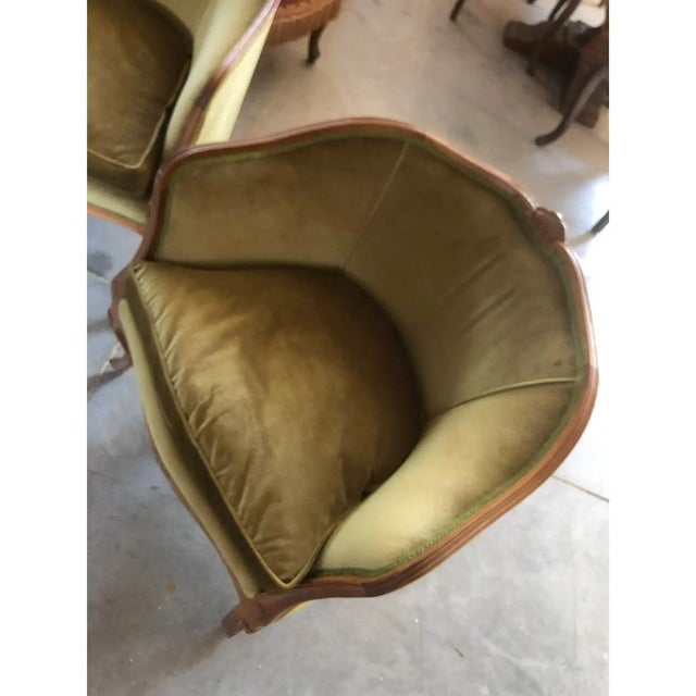 700 style set of two armchairs and a sofa in walnut wood carved by hand.Upholstered in goose down ricestiti in green silk...