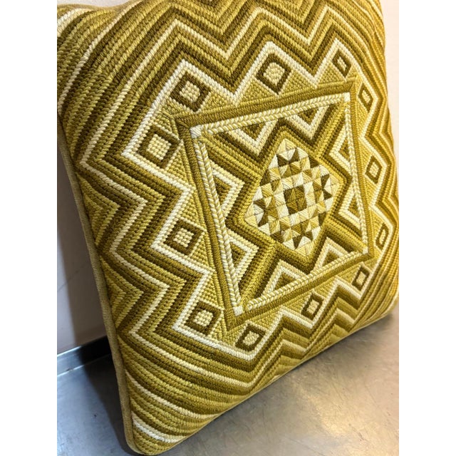1960s-70s olive needlepoint geometric pillow w/ olive velvet backing. Excellent condition. Measures 13.5" x 14".
