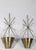 Pr. Mid Century wall mounted planters having steel starburst form brackets, which support brass conical stepped planters,...