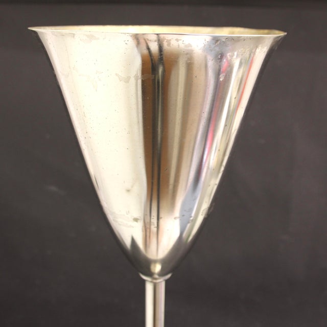 This well-designed table lamp was manufactured in the 1930s in Germany. It is made from nickel-plated tubular steel and...