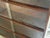 Mid-century Scandinavian bookcase in walnut veneer, equipped with sliding glass doors. Its simple and timeless design...