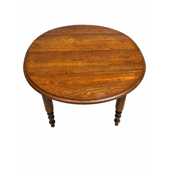Antique Solid Oak Extension Dining Table With 6 Original Leaves & Original Wooden Casters Circa 1940s–1950s For Sale - Image 4 of 7