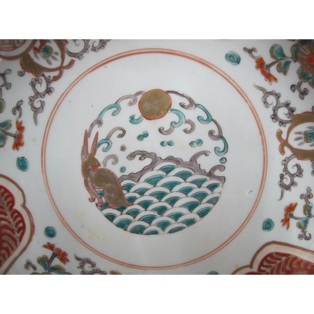 Unique and very sweet Japanese porcelain Arita bowl. Red, blue, and gilt Imari design of ornate flowers with a rabbit...