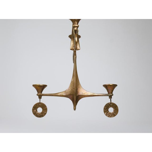 A decorative and substantial sculptural Brutalist Mid-Century Modern hanging pendant candle holder / candelabra /...