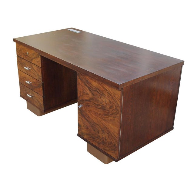 An original modernist desk from the 1930s. This piece has a dignified design with stylish proportions and details together...