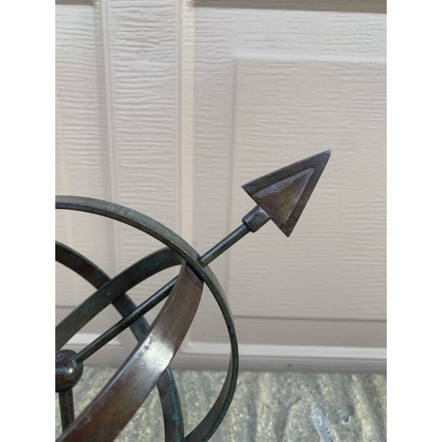 A beautifully crafted iron armillary sphere, evoking the timeless elegance of classical European gardens. Pieces like this...