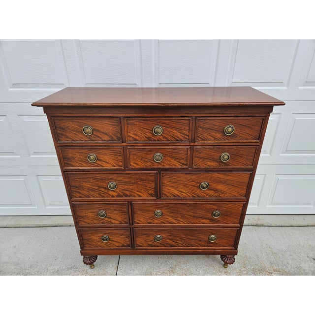 This wonderful mahogany eight drawer dresser by Baker Furniture Milling Road has a factory distressed look with large...