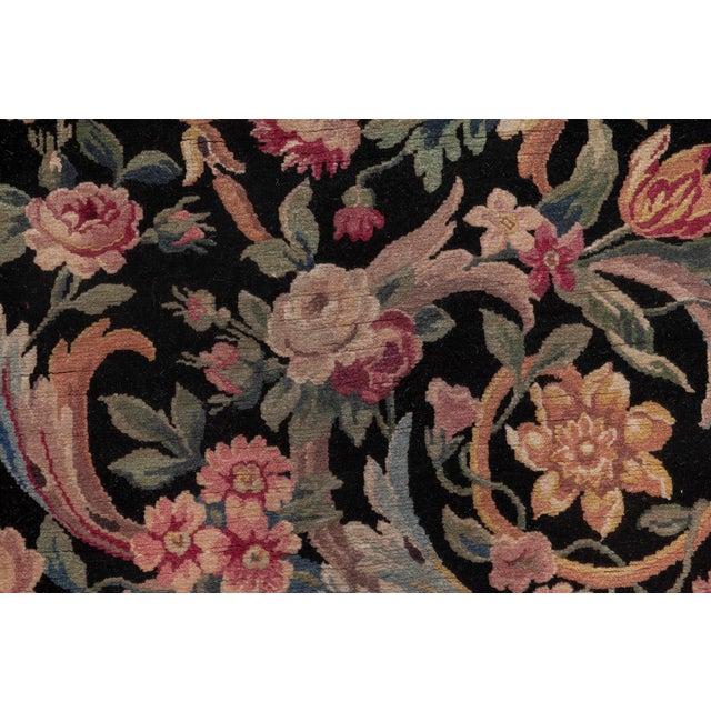 This exquisite antique Savonnerie rug, dating from the 1920s, beautifully exemplifies the grandeur and decorative richness...