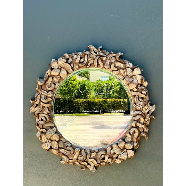 This exceptional vintage "cloud" mirror is a masterclass in sculptural wall decor, blending high Hollywood Regency glamour...