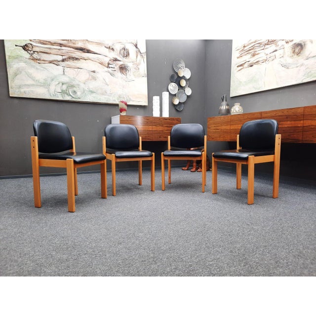 This set of four chairs was manufactured by Wilde + Spieth. Very high-quality workmanship and extremely sturdy. Seat and...