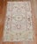 Mid 20th Century Turkish Oushak with a soft pink field, outlined in deep red Details rug no. 31522 size 3' 1" x 5' 8" (94...