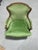 A medium size mahogany framed bergere upholstered in an emerald green velvet with a pink/red/green silk plaid used to...