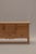 Beautiful solid oak sideboard designed by Henning Kjærnulf, showcasing the warm craftsmanship and understated elegance...