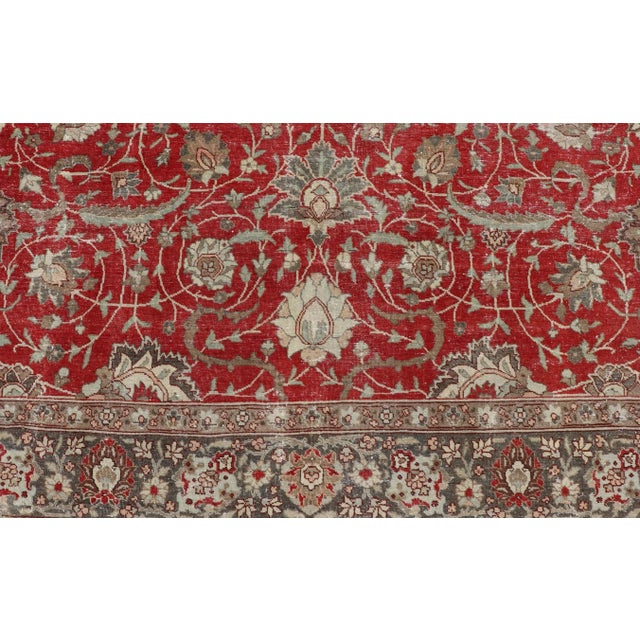 Antique Persian Fine Weave Tabriz in Red Background With Earth Tones For Sale - Image 10 of 12