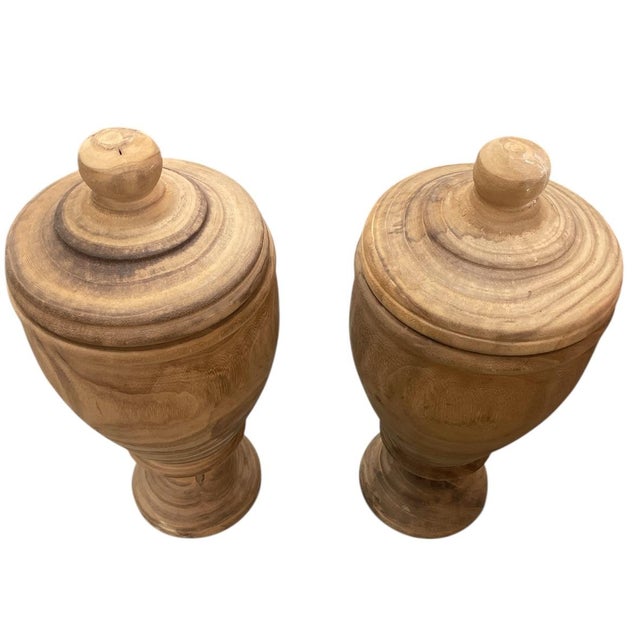 The manufacturer and specific wood species for this pair are unknown. However, the quality of the turning and the weight...