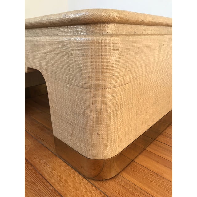 Elegant vintage coffee table believed to be by Harrison Van Horn, featuring a lacquered grasscloth surface and unlacquered...