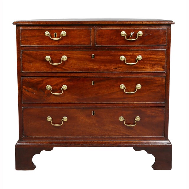 Antique dresser with rectangular molded top over two short drawers over three graduated drawers, bracket feet. Great...