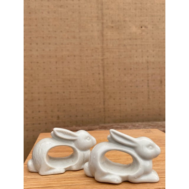 Two, slightly different fine porcelain rabbit napkin rings; one retains the "Made in Japan" sticker. These are great as...