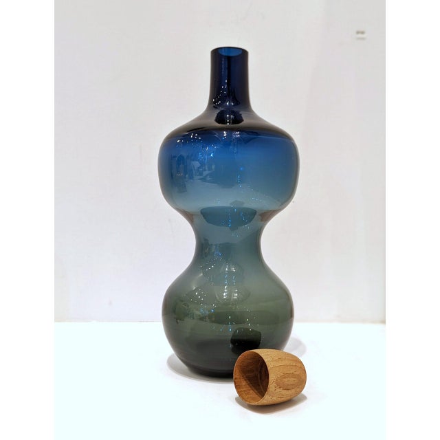 A Timeless Swedish Glass Decanter: Practical and Decorative Title: Multifunctional Swedish Glass Decanter by Göran Wärff...