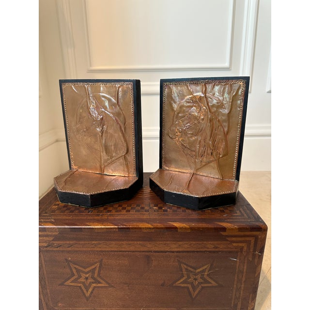 Gorgeous vintage pair of equestrian bookends, dating to the 1940’s. Handcrafted, embossed copper, each featuring a...