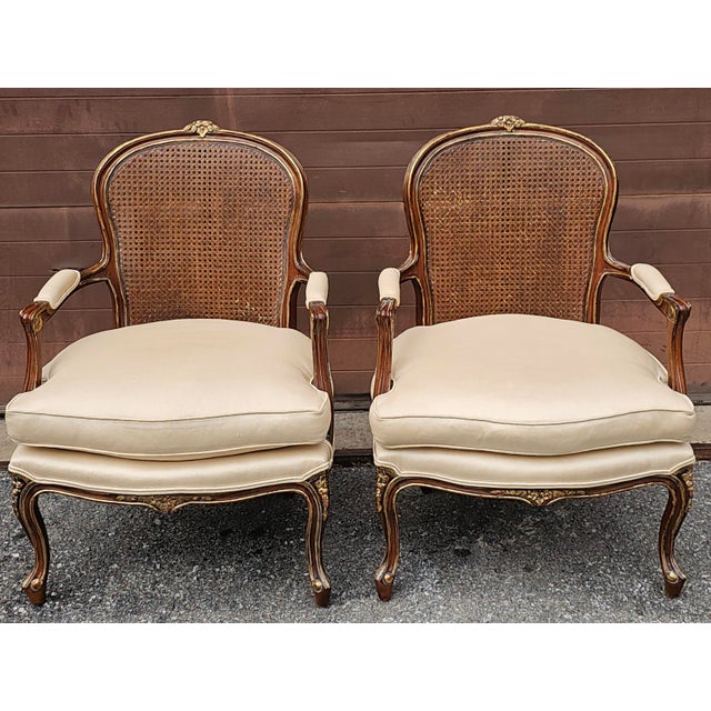 Pair Century Furniture Louis XV Provincial Style Partial Gilt and Carved Walnut with Cane Back and Upholstered Fauteuils....