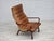 1970s, Scandinavian highback armchair. Original light brown furniture leather with patina, bent beech wood. Original good...