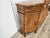 An elegant walnut sideboard crafted in Baroque style, characterized by sinuous lines and excellent construction quality. A...
