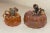 This pair of vintage hand blown studio glass iridescent orange pumpkin sculptures is a perfect addition to your...