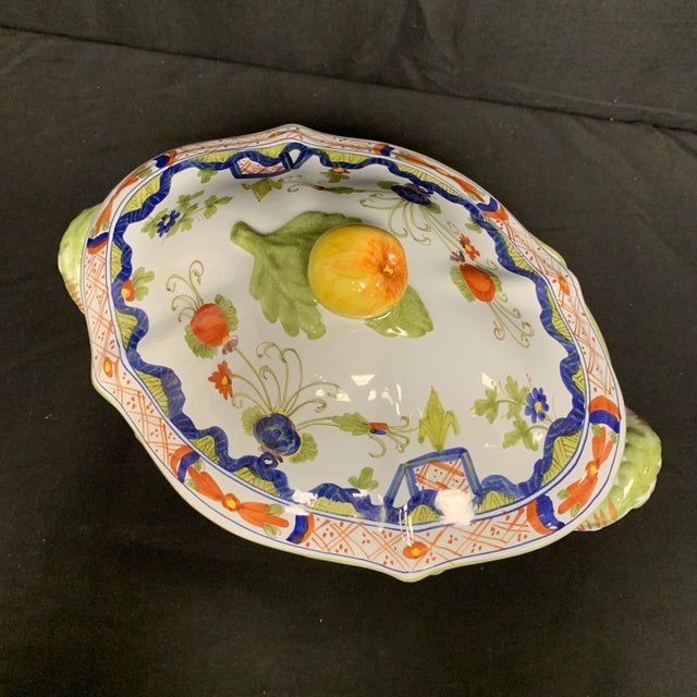 Dated from the late 20th century. Blue carnation covered bowl. Made in Italy. Detailed with floral designs and floral...
