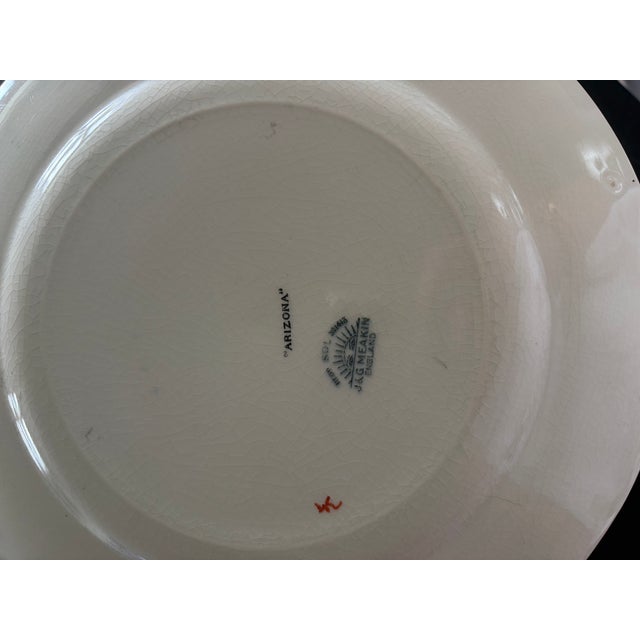 11 Dinner plate, 10 salad plates, 2 gravy boats, 3 food dishes, and 1 serving dish. These came from the Netherlands and...