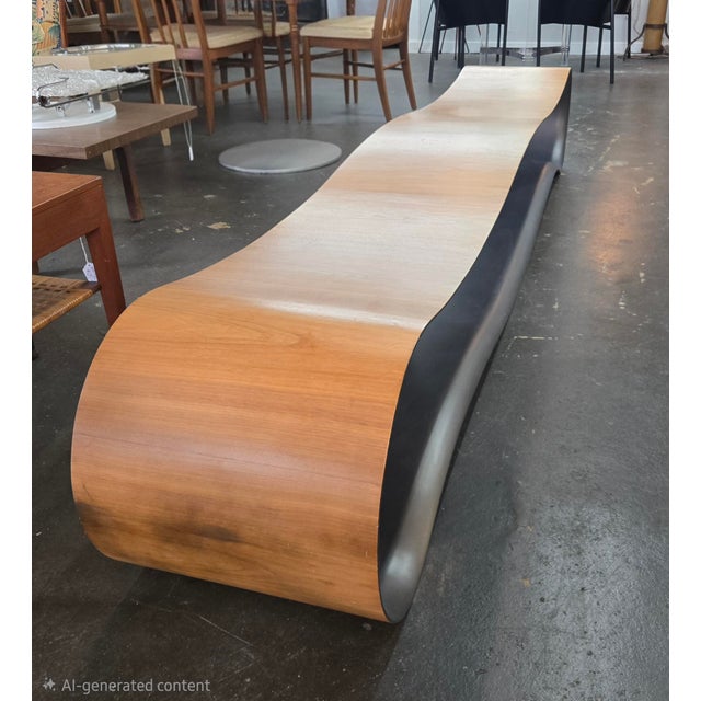 The Belmont bench, a Red Dot Award-winning piece, is more of a sculpture than a seat. Its wooden, walnut shell judiciously...