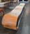 The Belmont bench, a Red Dot Award-winning piece, is more of a sculpture than a seat. Its wooden, walnut shell judiciously...