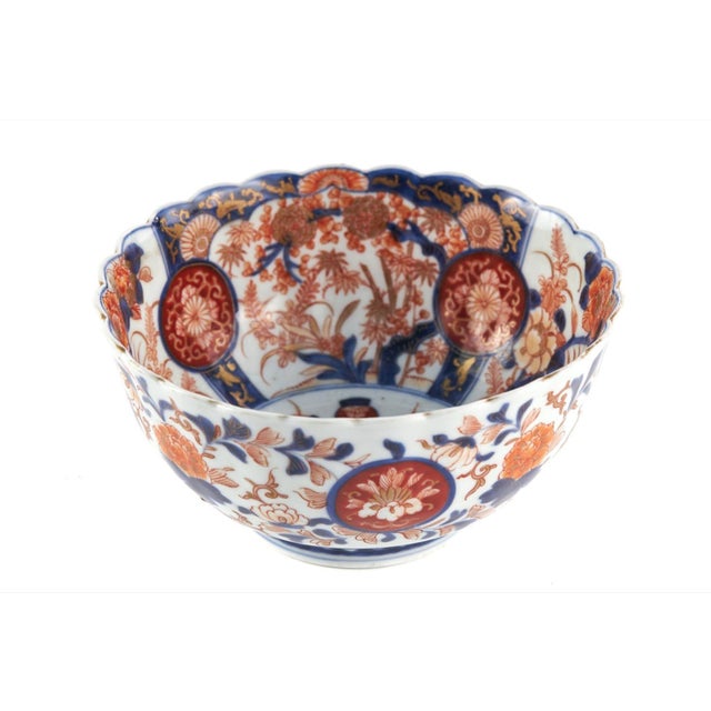 Offered for sale is this early 20th Century antique Japanese Imari bowl which is wonderfully hand painted in red, blue,...