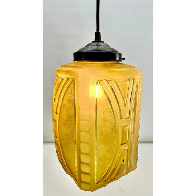 Art deco scailmont ceiling lamp. Photography fails to capture the simple elegant illumination provided by this lamp. As...
