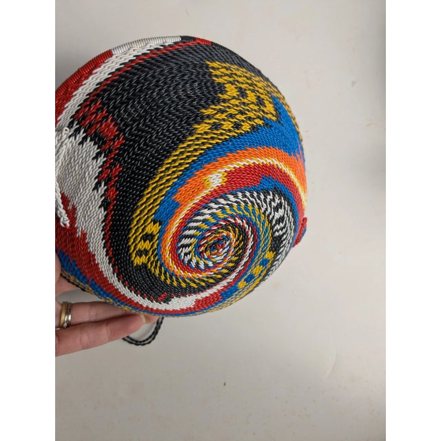 African Trio of Vintage Colorful African Handwoven Baskets For Sale - Image 3 of 9