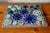 A colorful, bohemian ceramic plaque, this typically Swedish wall decoration was produced by Jie Gantofta, a Scandinavian...