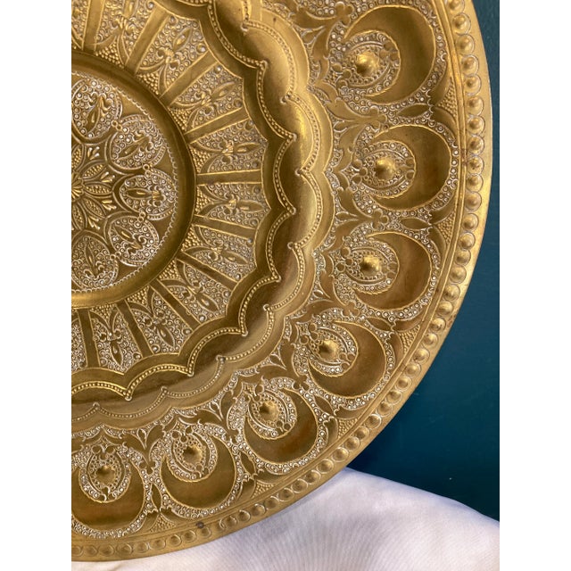 Bring timeless elegance into your home with this stunning vintage brass wall plate. Featuring an intricate hand-etched...