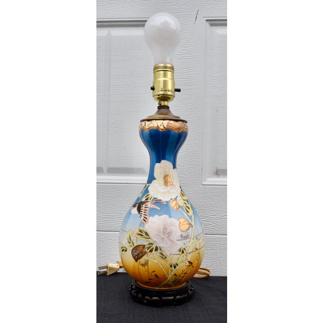 Vintage (1940's) Table Lamp has a Satsuma Style. Made of Porcelain with a Bird & Floral Motif and Gold Highlights. The...