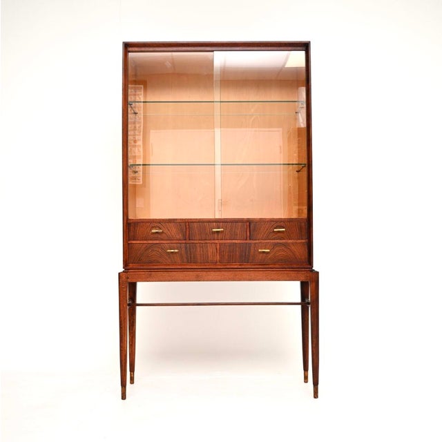 An absolutely gorgeous Swedish vintage display cabinet by Svante Skogh. This model is called the Cortina; it was made in...