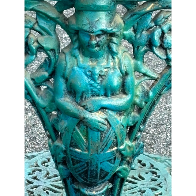 Late 19th C. Cast Iron Gueridon Style Table with artisan paint finish. Heavy cast iron highly decorated frame on three...