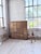A vintage pine workshop cabinet with numerous drawers, dating from the 1950s. We love its tall, shallow profile. Its many...